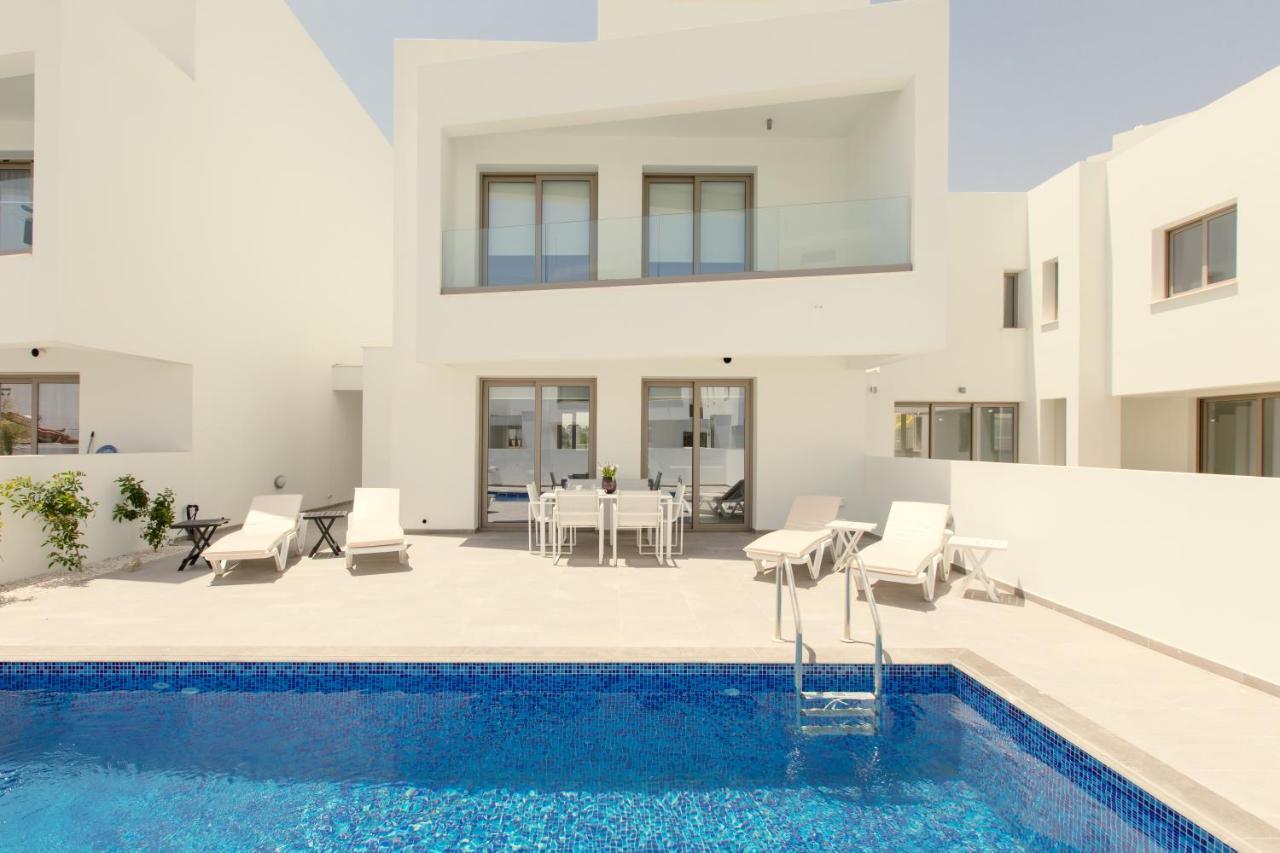 Palm Tree Villas Livadhia Buitenkant foto