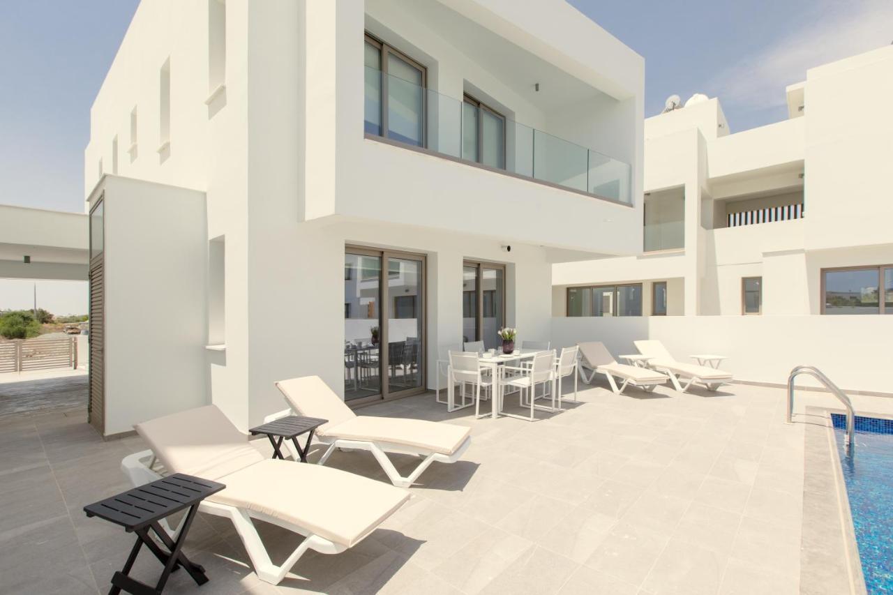 Palm Tree Villas Livadhia Buitenkant foto